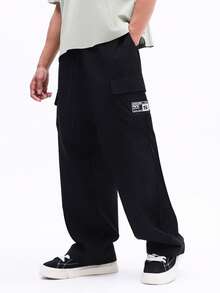 SUMWON Black Wide Leg Cargo Pants With Multiple Patch Pockets And Utility Details For Men Casual Streetwear - Black - View 1