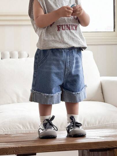 SHEIN Short en jean délavé et ample avec patchwork bleu bébé et poches effilochées