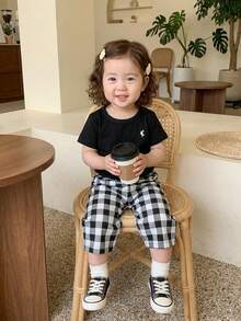 SHEIN 两件套女童夏季时尚简约街头风白色短袖T恤（黑色刺绣装饰）搭配杏色条纹裤，适合日常上学穿着 - 黑色 - 查看 13