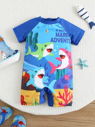 SHEIN Bộ áo liền quần ngắn tay cổ tròn phối màu tối giản in hình cá mập cho bé trai, thích hợp cho mùa hè, xuân/hè, ở nhà, đi chơi, nghỉ mát, đi biển, bơi lội.
