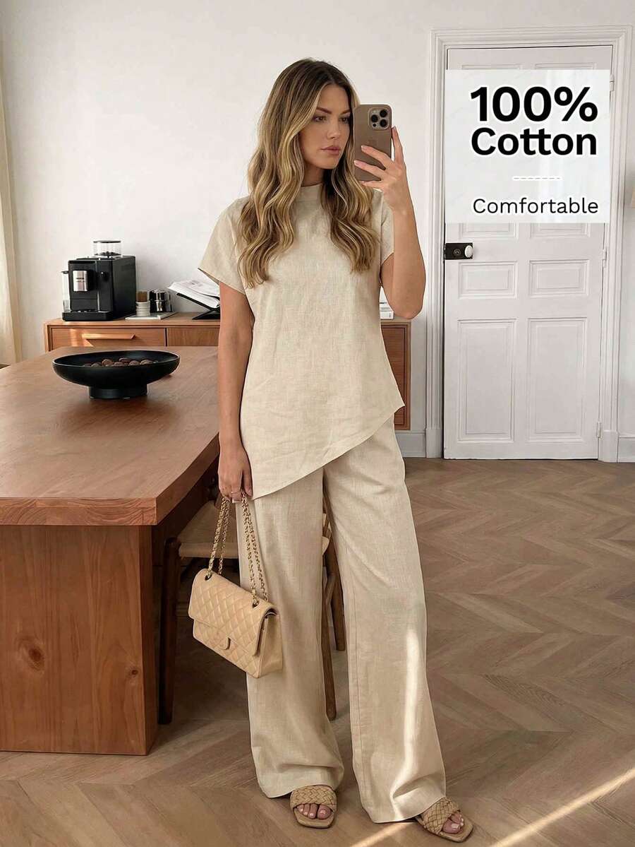 Easowa 100%纯棉杏色宽松女式两件套，立领蝙蝠袖短袖不规则下摆衬衫搭配长裤，保守时尚的套装，适合办公室、通勤和日常休闲穿着，春夏款。