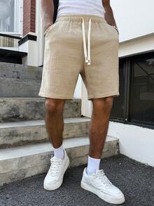 PAVTROS Quần short nam bằng chất liệu cotton nguyên chất, màu trơn, có túi xéo, cạp chun điều chỉnh. - Màu Khaki - Xem 4