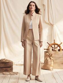 Zovinel Bộ vest mới gồm áo khoác dài tay cổ đứng, thắt eo và quần ống rộng cạp cao, phong cách thanh lịch. - Màu be - Xem 2