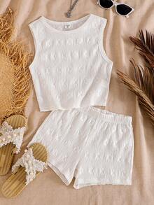 SHEIN 少女夏季简约提花套装，包括：无袖纹理背心、四叶草提花圆领上衣和配套短裤，面料柔软，适合夏季穿着；精致的提花设计，休闲外出和居家穿着皆宜；舒适易搭配，打造清新甜美的少女造型。 - 杏色 - 查看 3