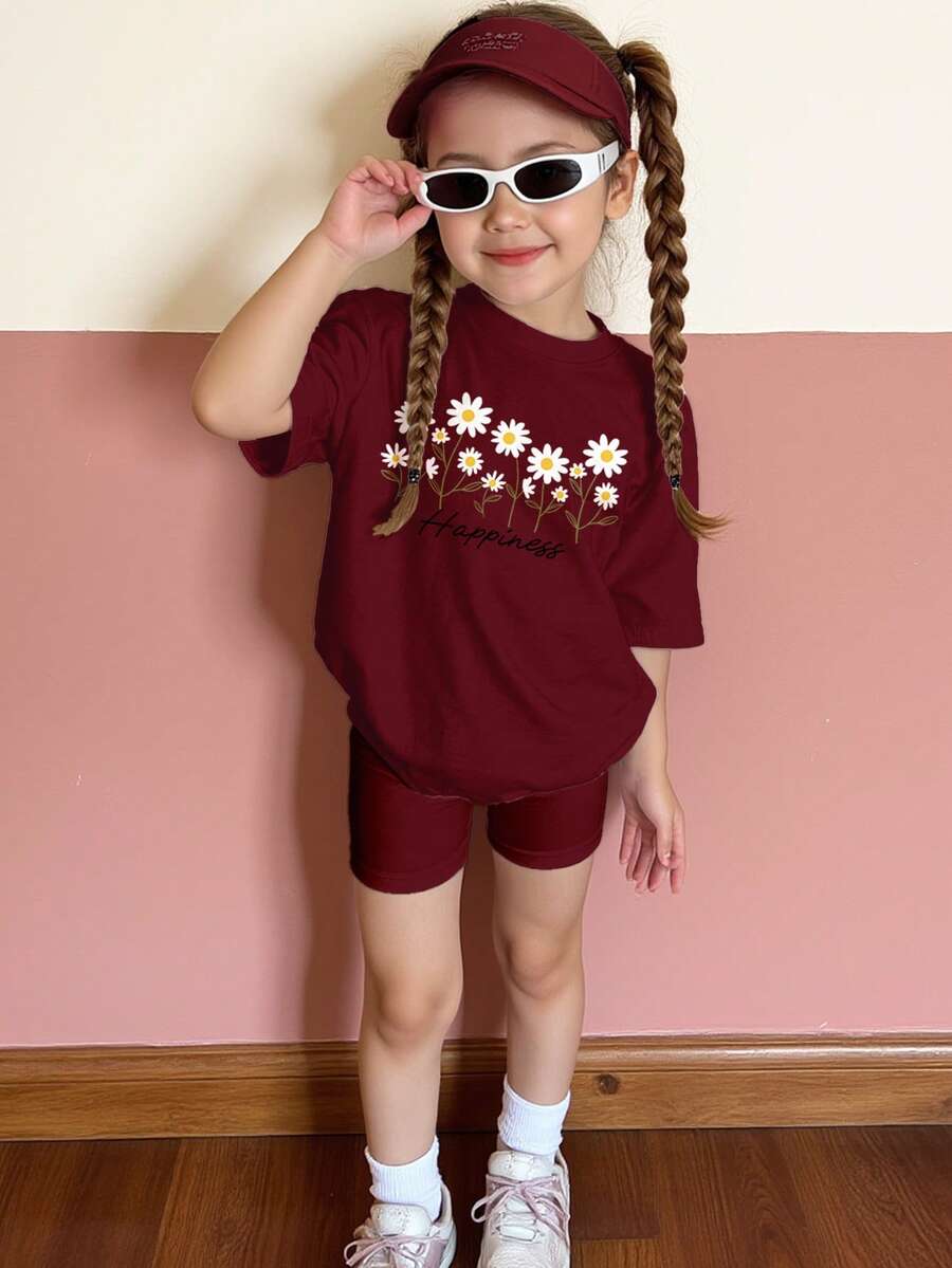 SHEIN Bộ đồ thể thao mùa hè cho bé gái, kiểu dáng thường ngày đi biển, gồm áo thun ngắn tay và quần short in họa tiết hoa cúc và chữ cái. - Nhiều màu - Xem 1