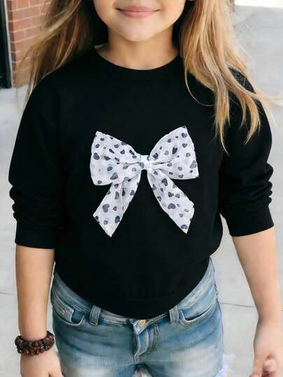 SHEIN Genkimix Kids Girls' Loose Fit Round Neck Long Sleeve T-Shirt, Black Top With 3D Bow Decor, Suitable For Spring/Summer Daily Wear, School, Casual Outings, Indoor Gatherings, Sweet & Cool Girl Style, Easily Create A Lively Little Princess Look Bow Shirts For Teens Girls Casual Printed Crew Neck Bow Shirt Cute Bow Shirt