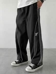 Manfinity Hypemode Men's Patchwork Contrast Trim Graphic Print Loose Casual Pants With Slant Pockets - Black - View 1