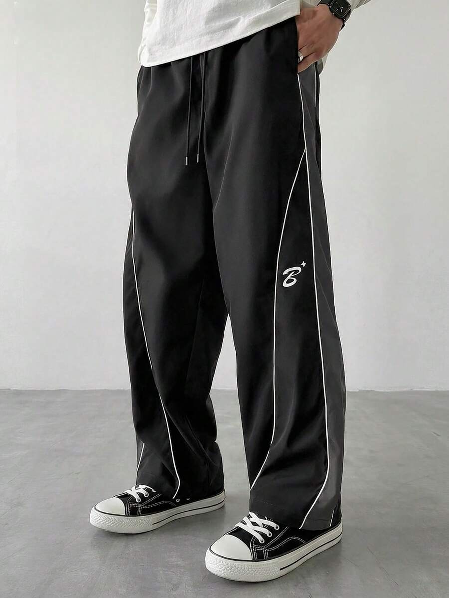 Manfinity Hypemode Men's Patchwork Contrast Trim Graphic Print Loose Casual Pants With Slant Pockets - Black - View 1