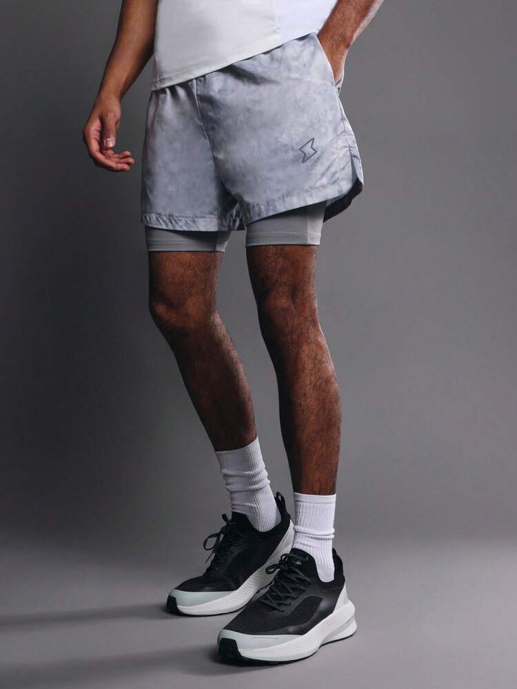 Shorts de malha tie-dye com forro de compressão