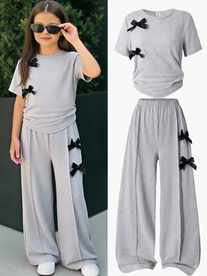 Girls Casual Everyday Round Neck Short Sleeve Cropped Black T-Shirt With 3D Bow Decor And Straight Loose Pants Summer Set