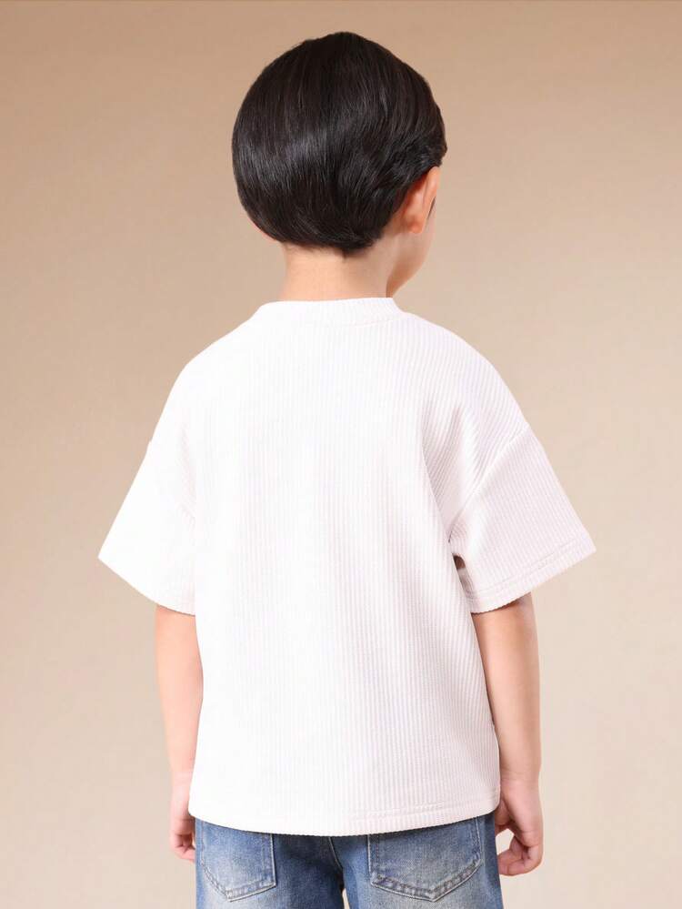 Textured Tee With Sun Embroidery