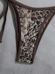 Swim SXY 2026新款女士泳装到货，适合上学、度假、约会、下午茶、西式、邮轮、海滩、海岛、公路旅行、四季皆宜、音乐节、波西米亚风度假、秋日休闲、西部波西米亚风等场合。优雅的豹纹亮片性感派对泳装两件套，女士海滩度假泳装动物纹比基尼，动物纹泳衣，动物纹泳装比基尼套装，性感比基尼，可爱棕色比基尼两件套，女士性感豹纹比基尼，挂脖比基尼，蝴蝶翅膀墨西哥比基尼，蝴蝶比基尼两件套，带翅膀比基尼两件套，棕色印花比基尼，沙滩装，闪光比基尼，亮片比基尼，猎豹纹比基尼，蛇纹比基尼。 - 彩色 - 查看 4