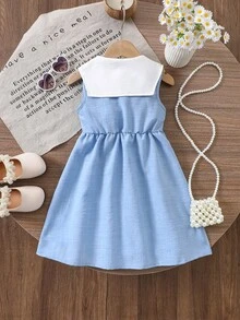 SHEIN Vintaside Kids Đầm không tay màu xanh dương cho bé gái, chất liệu vải mềm mại, thân thiện với da, cổ áo thêu hoa nhiều màu sắc, thiết kế cài cúc đơn giản phía trước, eo xếp ly tạo dáng xòe, dáng rộng rãi thoải mái, thích hợp mặc hàng ngày vào mùa xuân/hè, đi công viên, chơi cùng bạn bè, đến trường mầm non, dự tiệc sinh nhật, dã ngoại ngoài trời. - Màu xanh lam - Xem 2