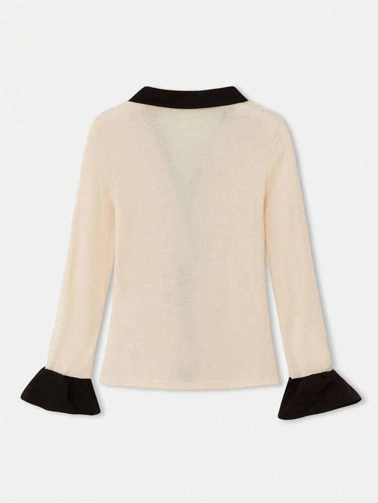 Beige Knit Shirt With Black Contrast Ruffles And Long Sleeves With Flared Cuffs Vintage Chic Autumn Winter.