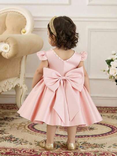 Glamorique Kids 女婴纯色荷叶边袖夸张蝴蝶结装饰优雅连衣裙