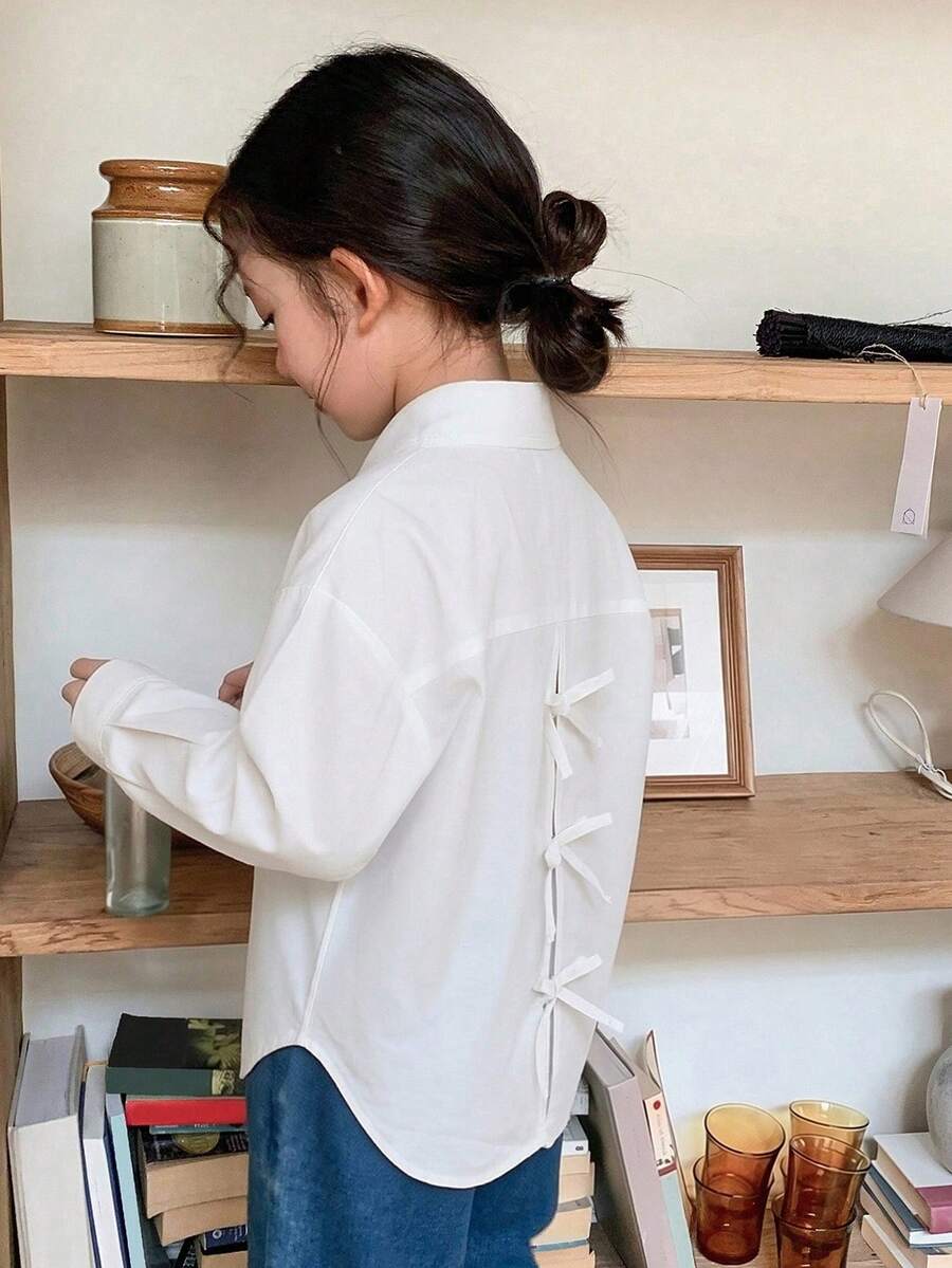 Dazy Kids 女童休闲衬衫,后背蝴蝶结设计,适合日常穿着,简约时尚。 - 白色 - 查看 1