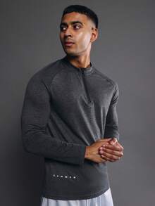 SUMWON Top de performance à demi-zip à manches longues en jersey absorbant l'humidité avec logo sur la poitrine, pour l'entraînement et les séances de sport - Gris - Voir 1