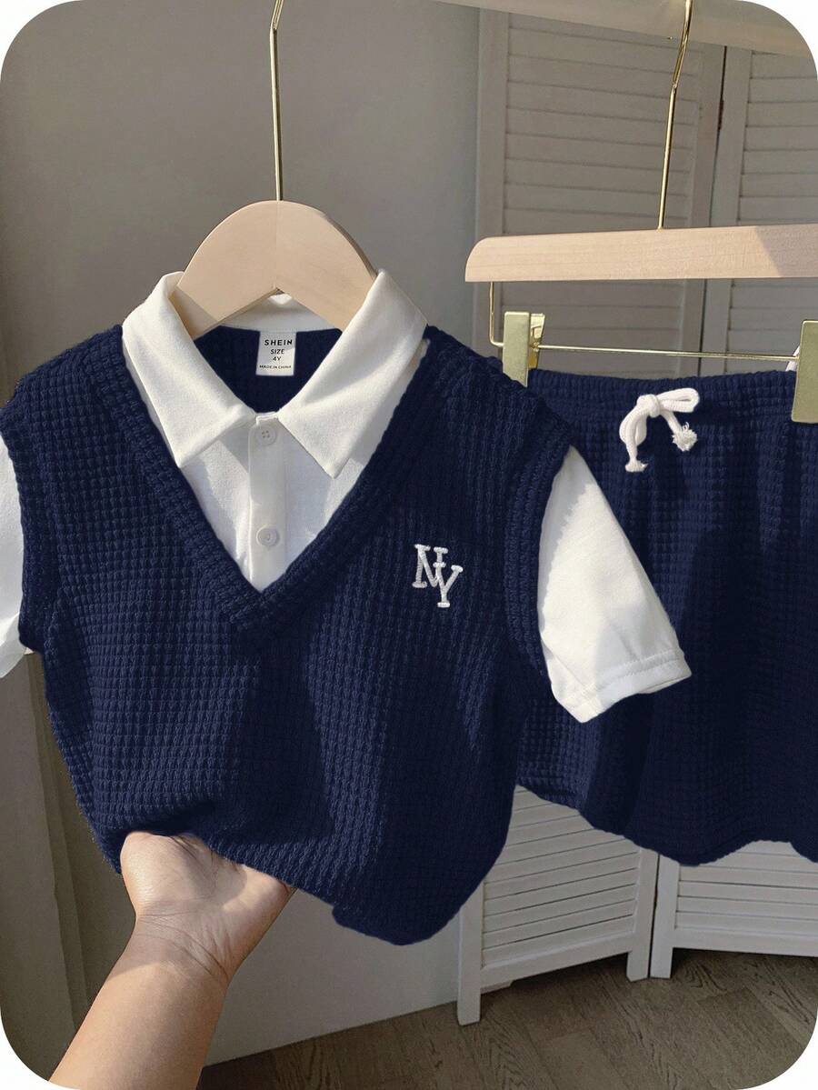 SHEIN Bộ 2 món đồ dành cho bé trai, kiểu dáng thường ngày, thoải mái, thời trang, tối giản, tiện dụng, chất liệu vải waffle mềm mại, in chữ, gồm áo thun ngắn tay và quần short, thích hợp mặc hàng ngày, đi học, dã ngoại, thể thao, mùa xuân/hè. - Màu xanh hải quân - Xem 1
