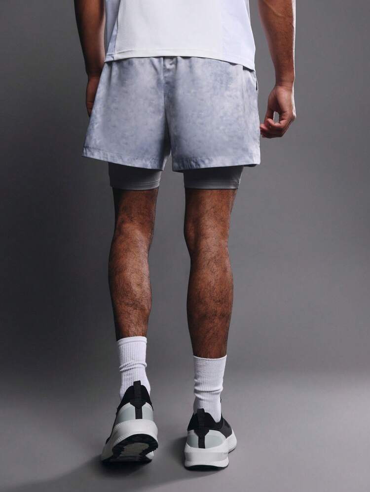 Shorts de malha tie-dye com forro de compressão