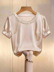 SHEIN Clasi Blusa de satén elegante con cuello redondo y manga corta, con cuentas, talla grande, adecuada para volver al colegio, fiestas, Navidad, bodas, Día de la Madre, festivales de música, San Valentín, primavera/verano - Albaricoque - Ver 1