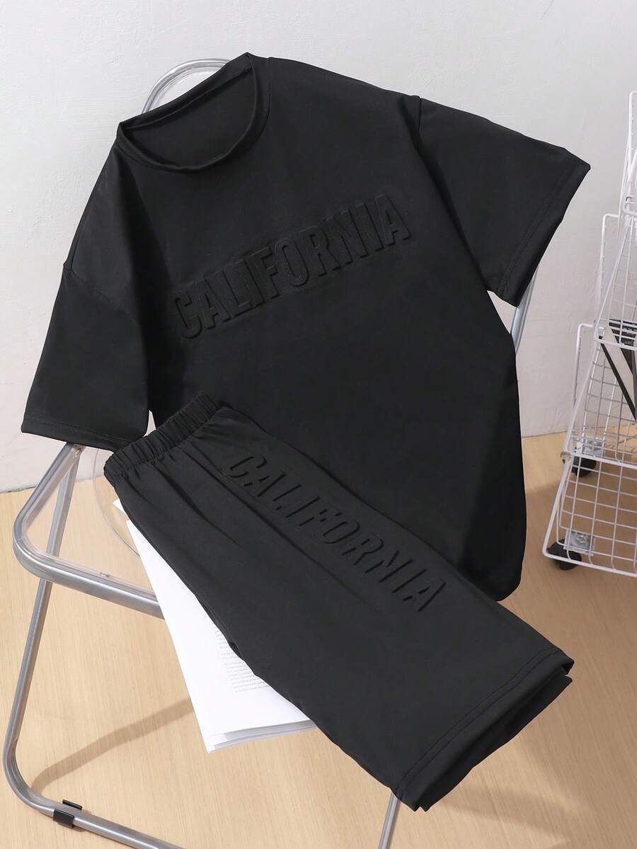 Mirajuku 2件套青少年男童休闲度假时尚运动短袖T恤和短裤套装，浅绿色，3D字母印花简约运动装，夏季 - 黑色 - 查看 1