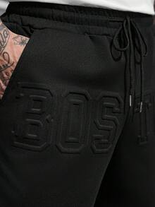 Manfinity CasualCool Men's Street Style Drawstring Shorts, Loose Minimalist Large Font Letter Embossed Shorts - Black - View 6