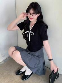 DAZY Women's Summer Design Patchwork Ruffle Trim Bow Tie V-Neck Fitted Cropped Knit T-Shirt Top - Black - View 1