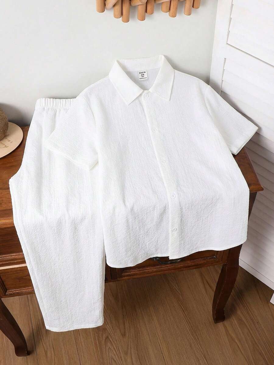 两件套男童休闲学院风舒适时尚简约实用柔软波浪纹理 Polo 领短袖 T 恤和松紧腰长裤套装，适合秋季、春季、夏季穿着，适合日常穿着、户外活动、上学、街头风、派对和休闲场合。 - 彩色 - 查看 1