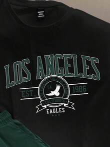 Manfinity Joysei 标准尺码男士休闲洛杉矶标语字母印花黑色上衣和绿色裤子T恤套装，男士两件套，适合夏季穿着，男士夏季套装，男士短袖T恤短裤套装，男士图案T恤短裤 - 彩色 - 查看 2