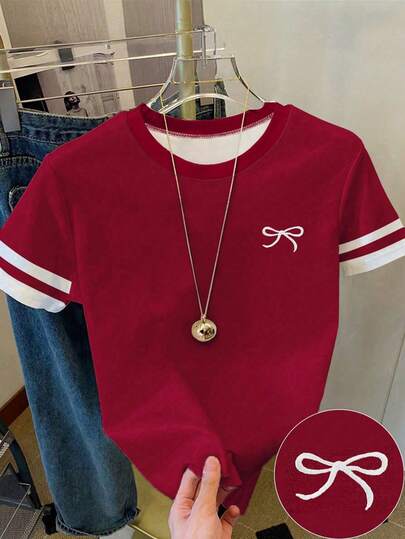 女童休闲蝴蝶结装饰短袖圆领T恤，适合夏季度假，红色修身日常穿着，白色条纹时尚舒适百搭，酒红色蝴蝶结可爱适合春夏秋冬四季穿着，修身短袖条纹撞色T恤