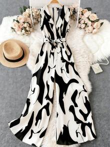Franclia This Women's Black And White Abstract Print Deep V-Neck High-Waisted Jumpsuit With A Tie Is Suitable For Summer, Spring, Valentine's Day, Carnivals, Beach, Parties, Birthdays, Elegant Occasions, Vacations, Casual Wear, And Graduation Seasons. (Summer Outfits, Women's Summer Outfits, Spring Outfits, Spring Break Outfits, Women's Valentine's Day Outfits, Carnival Outfits, Women's Party Jumpsuits, Women's Elegant Outfits, Women's Holiday Outfits, Summer Vacation Outfits, Women's Casual Jumpsuits, White Jumpsuits, Women's Casual Wear)Fashionable Casual Commuter Wear, Business Office Wear, Versatile And Stylish Everyday Casual Wear, Urban Teacher's Professional Attire - Black and White - View 8