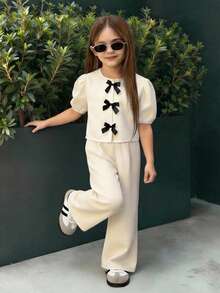 Firerie Kids 两件套女童蝴蝶结装饰泡泡袖上衣+宽松裤套装，休闲可爱时尚，适合外出、拍照、公园、露营、日常、派对、度假等场合。 - 白色 - 查看 4