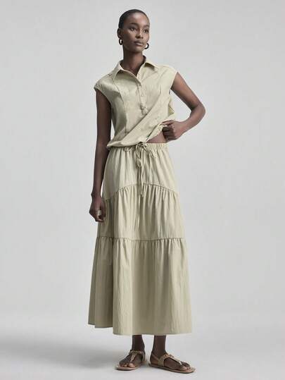 Ontre 2026春夏新款女士两件套，军绿色衬衫搭配褶皱半裙，舒适柔软的梭织面料，翻领短袖，纽扣宽松版型，带口袋，现代都市时尚商务休闲办公装