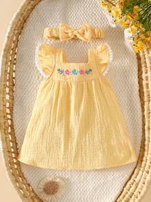 Bộ 2 món gồm váy áo vest cotton thêu hoa mùa hè cho bé gái, viền ren trắng và băng đô cài tóc nơ cùng màu. - Màu vàng - Xem 4