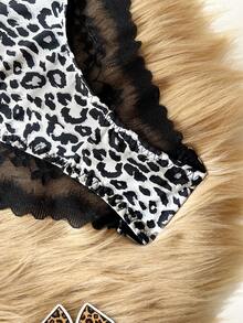 Bare Chapter Quần lót nữ họa tiết da báo, gợi cảm và quyến rũ, chất liệu vải mềm mại nhẹ nhàng, cạp cao giúp định hình vòng ba, thoải mái cho mùa hè. - Đen và trắng - Xem 9