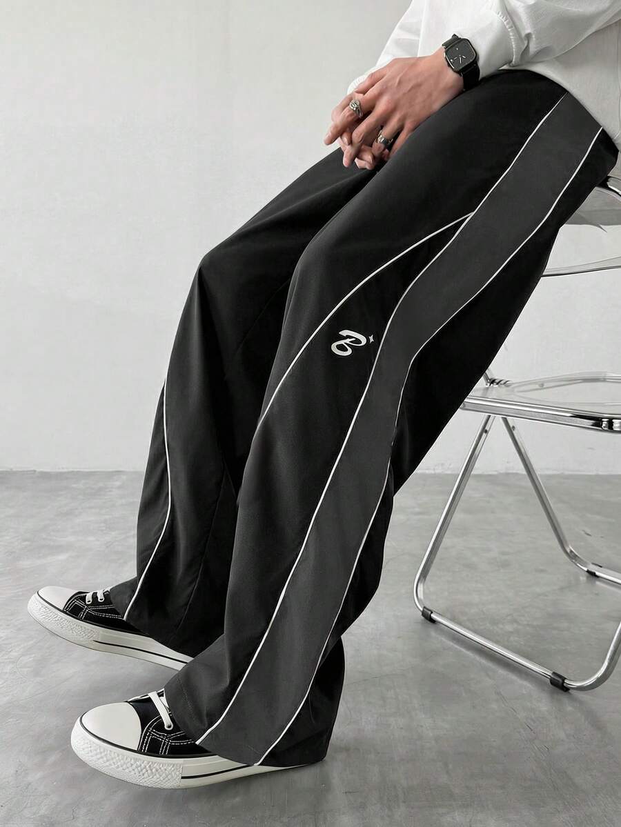 Manfinity Hypemode Men's Patchwork Contrast Trim Graphic Print Loose Casual Pants With Slant Pockets - Black - View 1