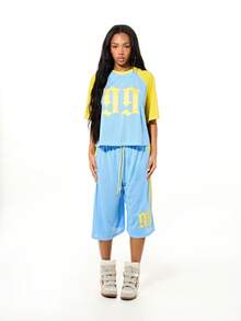 SUMWON WOMEN Women's Oversized Basketball Mesh Shorts With Contrast Panel Yellow Striping And Graphic Logo Design For Street Style Summer - Blue - View 3