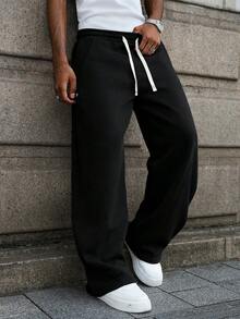 Manfinity EMRG 男士宽松休闲运动裤，百搭街头风慢跑裤，适合街头穿搭、日常休闲、周末郊游、音乐节、社交聚会等各种场合。这款裤子是男士衣橱中必备的百搭单品，也是送给男友或老公的绝佳礼物。宽松运动裤，男士休闲运动裤，灰色宽松运动裤 - 黑色 - 查看 7