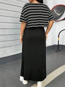 SHEIN Essnce 大码女装春夏时尚休闲宽松舒适日常杏色条纹短袖露脐上衣和黑色马甲长裙两件套，适合机场穿搭、外出服、返校季、开学季、居家休闲等场合。 - 黑色 - 查看 2