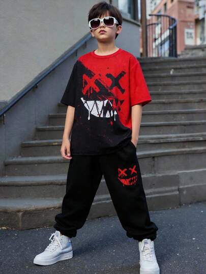 SHEIN 2pcs/Set Tween Boy Casual Street Tie-Dye Graffiti Graphic Round Neck Short Sleeve T-Shirt And Shorts Set, Suitable For Commuting, School, Daily Casual, Sports, Street Style, Spring/Summer