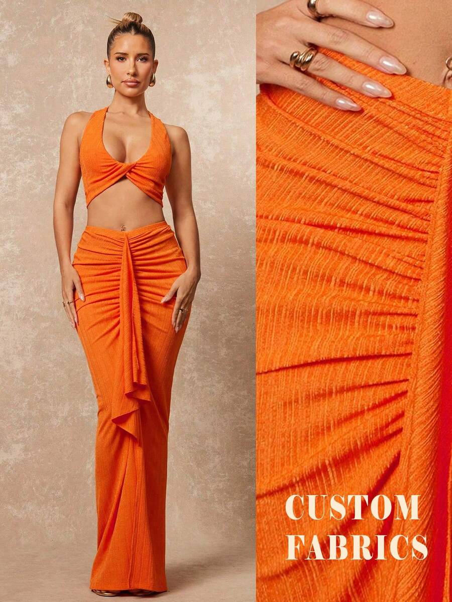 Lumalex Bộ 2 món gồm áo quây hở lưng và chân váy quấn cạp thấp dáng suông lấp lánh dành cho nữ.