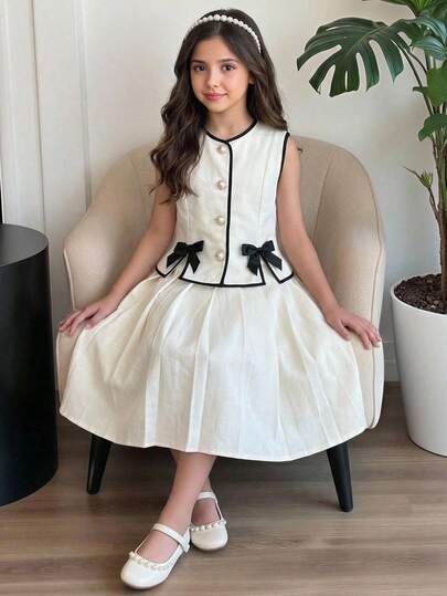 SHEIN 少女休闲通勤优雅撞色条纹领带、珍珠纽扣开衫背心上衣和百褶中长裙套装，杏色