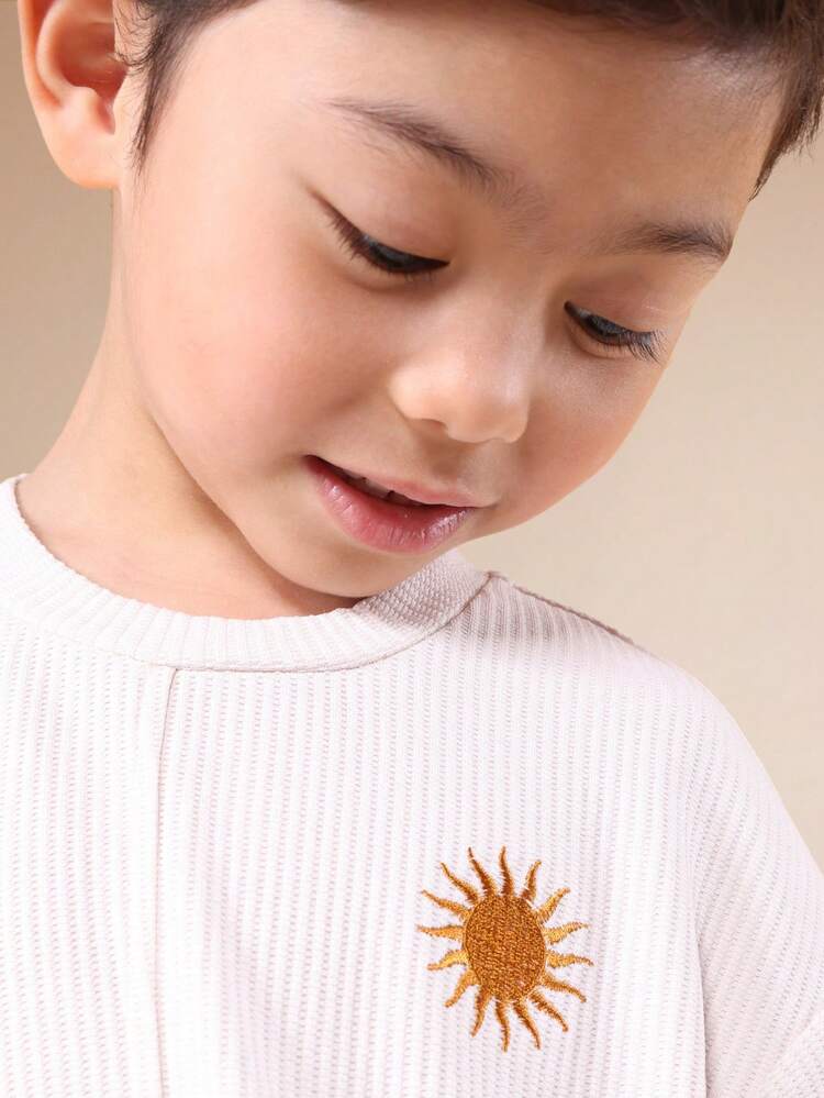 Textured Tee With Sun Embroidery