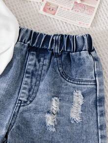 Bộ 2 món cho bé gái mùa hè, gồm áo thun trắng tay ngắn cổ tròn thắt nơ và quần short denim rách, kiểu dáng thường ngày. - Nhiều màu - Xem 5