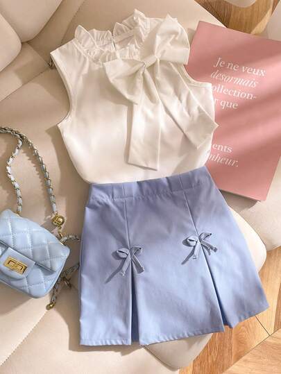 SHEIN 2pcs/Set Toddler Girls' Summer New Sleeveless Vest With Floral Trim Collar And Bowknot Decor, Minimalist Shirt With A-Line Skirt With Front Slit And Bow Design, Simple Commuter Chic Outfit