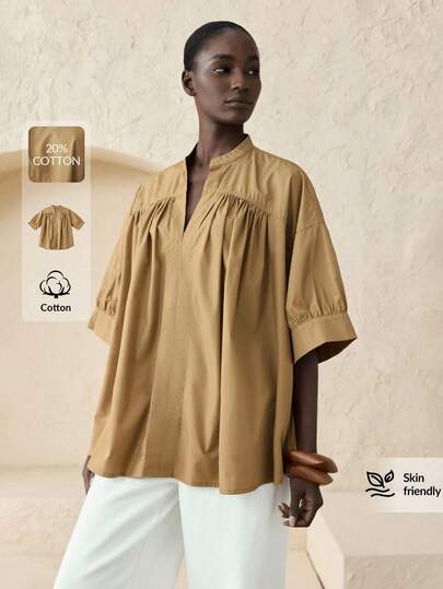 Ontre قميص نسائي بلون أحادي ذو رقبة على شكل حرف V مطوي مع كتف منخفض، فضفاض وكاجوال، ملابس مكتبية رسمية بطابع عتيق أنيق، مناسب للتنقل الحضري والطراز الراقي للمطار، مصنوع من خامة عالية الجودة