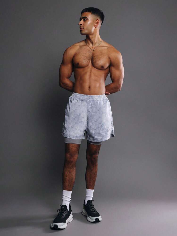 Shorts de malha tie-dye com forro de compressão