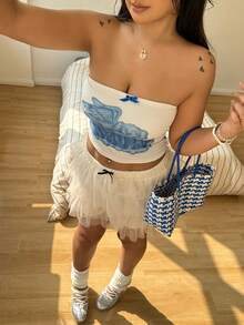 Sunnyshic Quần short nữ cỡ lớn kiểu vintage lãng mạn gợi cảm với chất liệu lưới ren nhiều lớp, xếp ly, có nơ trang trí, phù hợp cho các lễ hội âm nhạc, mặc thường ngày, mặc ở nhà, phong cách ngọt ngào, Y2K, đa năng, đi biển, đi học, mùa hè và mọi mùa. - Màu be - Xem 4