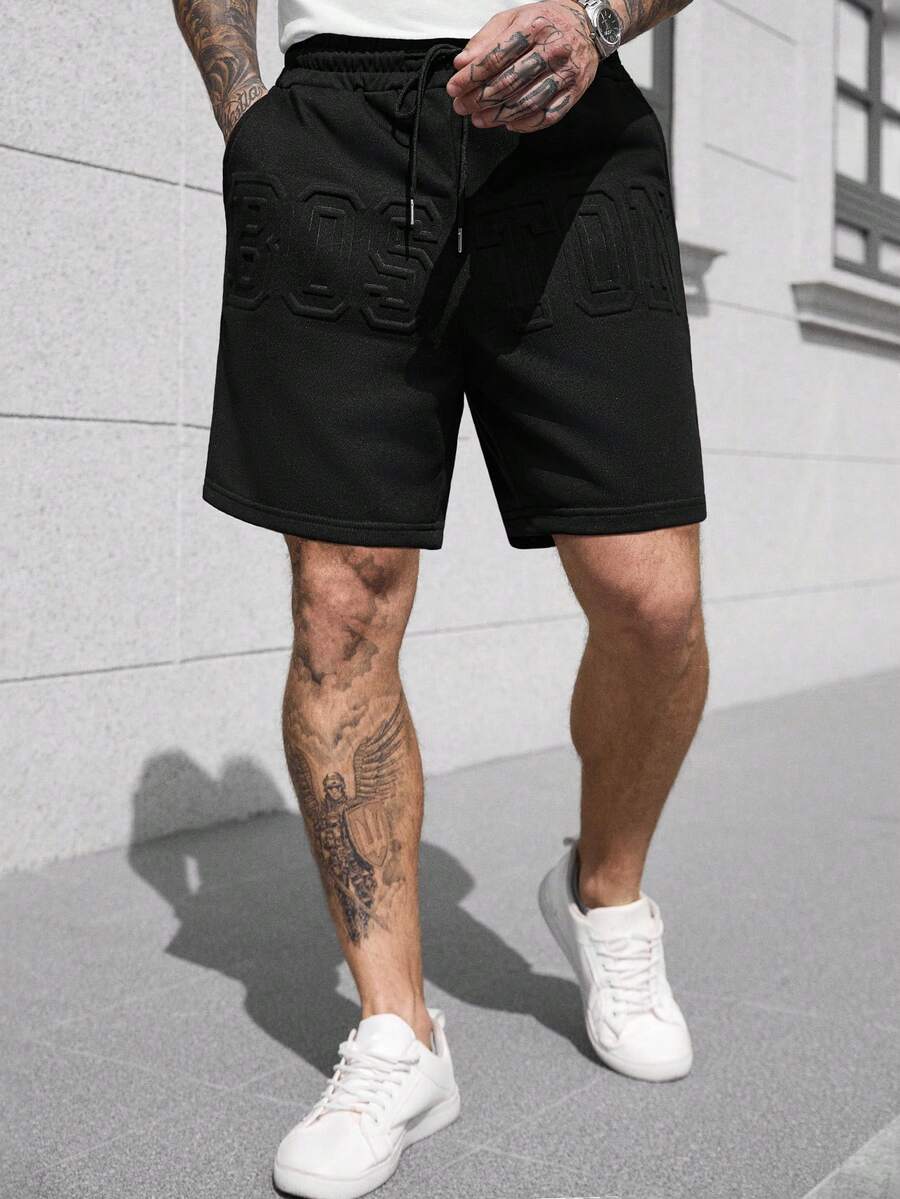 Manfinity CasualCool Men's Street Style Drawstring Shorts, Loose Minimalist Large Font Letter Embossed Shorts - Black - View 1