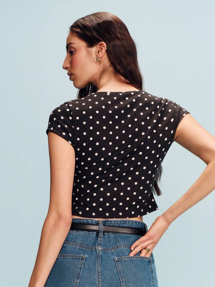 Polkatdot Stretchy Tee With Open Neckline And Bows Detail Chic Top Spring Summer Vacation French Style Parisian Style Black And White Top